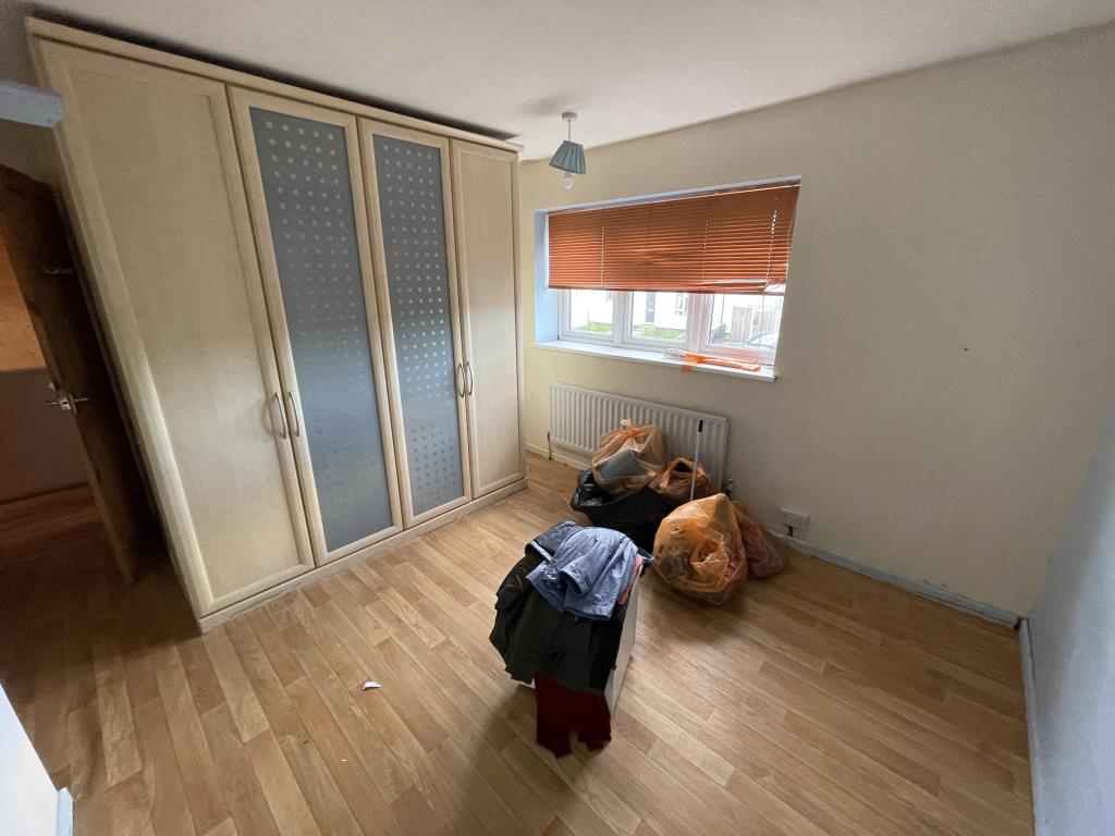 Lot: 95 - HOUSE IN POPULAR RESIDENTIAL AREA FOR INVESTMENT OR OCCUPATION - Inside image of Bedroom 2 from hallway